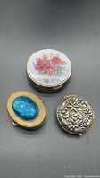 All three decorative pill boxes grouped