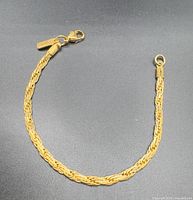 Full view of gold-tone rope chain bracelet