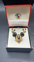 Set in original Mickey & Co. box showing brooch and earrings