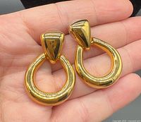 Front view of both earrings showing design and finish