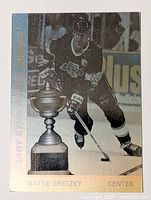 Front of hologram card showing Gretzky and trophy