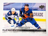 Front of Connor McDavid Photo Finish card showing action image and card text