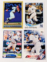 all four Alex Rodriguez Topps baseball cards laid out