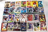 full spread of 28 football cards