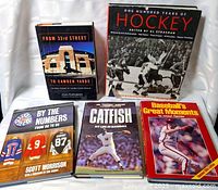 All five sports books front covers visible