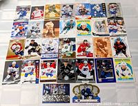 All 30 hockey cards laid out in six-by-five grid