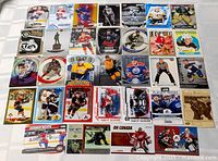 All 32 hockey cards laid out in grid