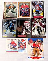 All eight Patrick Roy hockey cards laid out