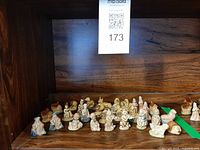 All 30 Wade Whimsies figurines on shelf