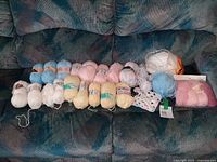 All skeins laid out on couch for overall view