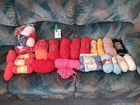 All skeins laid out on couch for count and colour overview