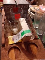 Overview showing bubble beer mug, boxes, small glasses, tray and playing cards