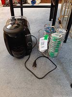 Bosch Tassimo machine with pod carousel and pods