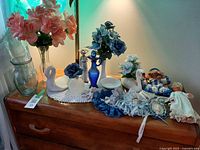 Overall view of all decorative items on dresser