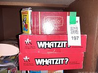 Baffles, Hearts deck, two Whatzit? boxes on shelf
