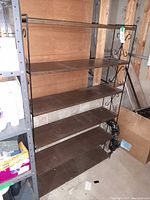 Full view of metal scroll 5-shelf bookcase