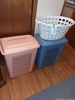 Peach hamper, blue hamper, white basket grouped