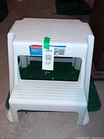 Front view showing both steps and label