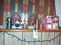All candles and wax flakes lined on shelf