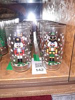 Row of nutcracker glasses on shelf