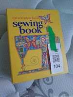 Front cover of yellow binder showing title and graphics