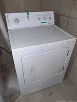 Front and right side view of white Kenmore 80 Series electric dryer
