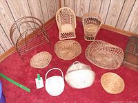Group shot showing all wicker baskets, chairs and metal rack
