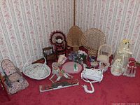 Full lot overview showing variety of miniature wicker furniture, dolls and accessories