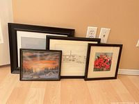 Front view of all four framed artworks
