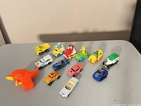 Group shot of all twelve vehicles on table