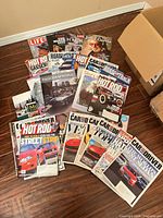 Top-down view of entire stack on floor highlighting variety of titles