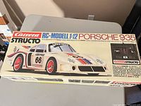 Outer box top showing Carrera Structo RC-Modell 1:12 Porsche 935 graphics