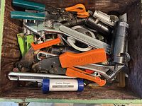 Drawer of assorted cable tools including compression tool, cable ringer, strippers, cutters