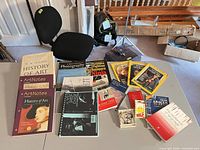 Full lot overview on table showing all books and magazines