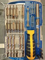 Interior view of Mastercraft driver set showing bits, handles, holder