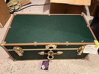 Closed trunk showing exterior color and hardware