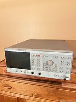 Front view of Wiltron 6407 RF analyzer showing display, controls, RF connectors