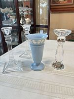 Group shot showing vase and three candlesticks