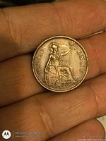 Reverse of 1928 UK half-penny showing seated Britannia and date