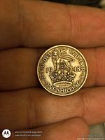 Reverse with crowned lion on crown, date 1948 and denomination