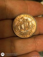 Reverse side showing Golden Hind ship, date 1967, legend HALF PENNY