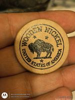 Obverse of wooden nickel showing buffalo design and text