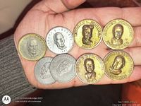 Obverse showing eight Prime Minister portraits and dates