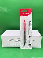 Box containing 12 Monami RX Zeta pens with one blister-carded sample displayed