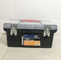 Front view showing brand label, dual metal latches, size marking