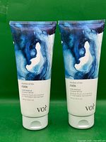 Front view of two identical Voir Rhythm of the Rain Hair Masque & Scalp Detox tubes