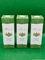 Front view of three Bona Dea Feminine Oil Spray boxes
