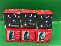 Six boxed Christmas Light dual-tip charge cables front view
