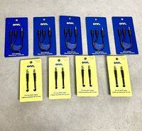 Group view of all 9 Onn audio accessories: 5 blue-card splitters, 4 yellow-card 6 ft cables