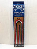 Front view of boxed Bicycle cribbage board